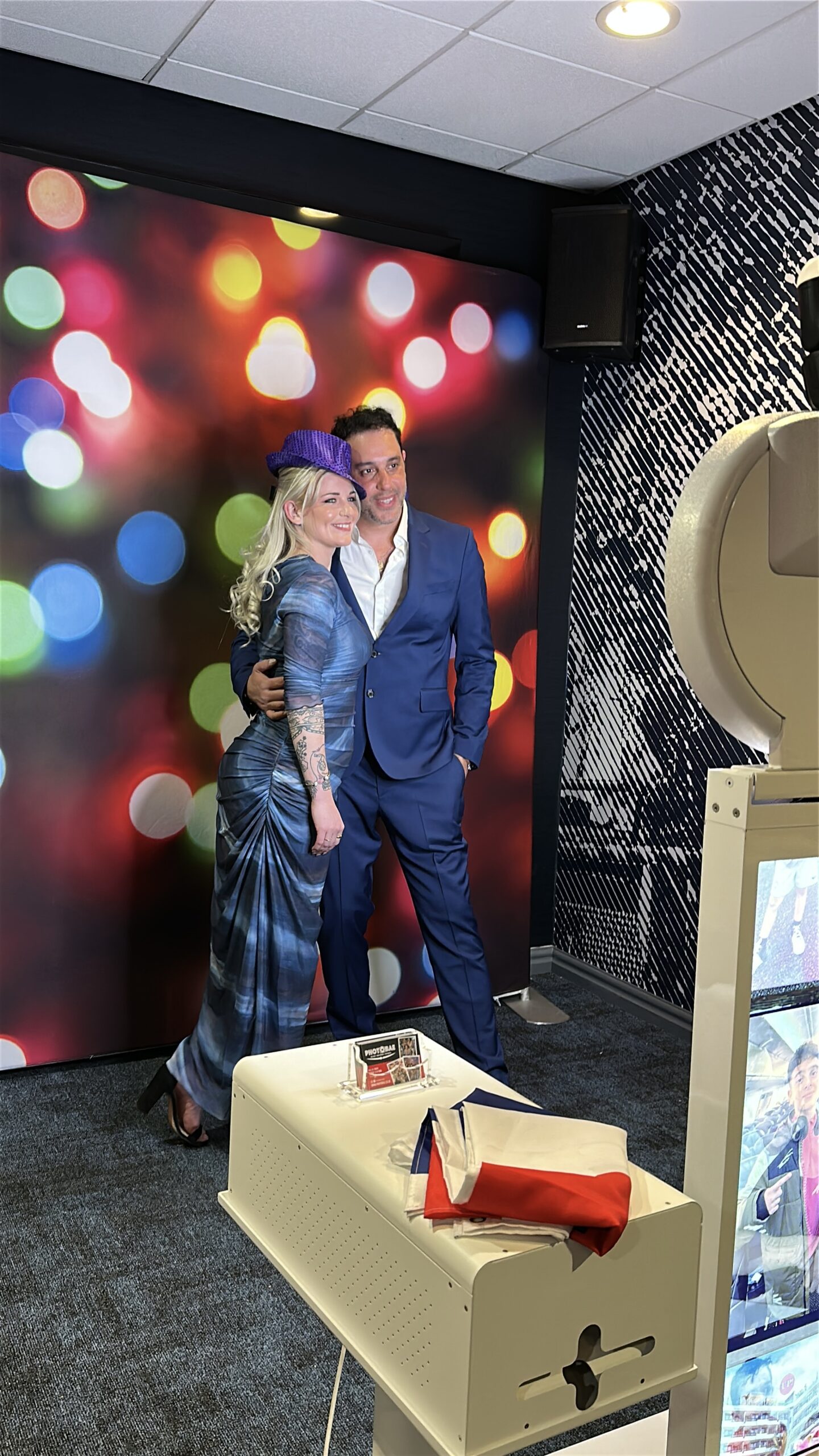 Couple posing with digital photobooth