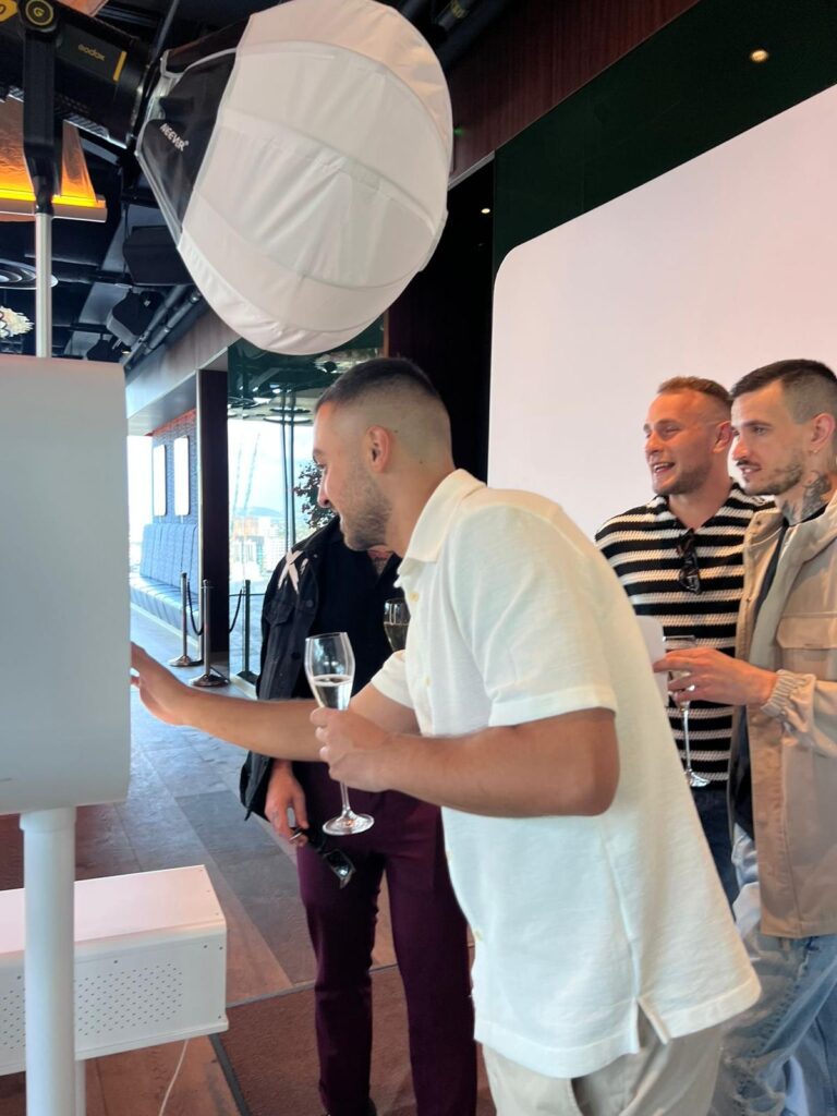 guest interacting with newspaper photobooth